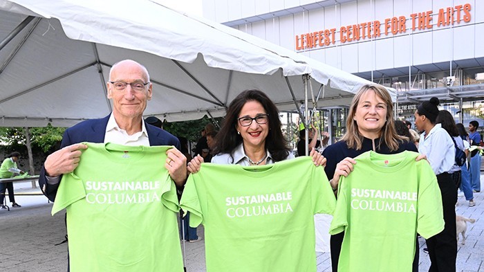 From left: Teachers College President Thomas Bailey, Columbia President Minouche Shafik, and Barnard President Laura Rosenbury hold up "Sustainable Columbia" T-shirts.