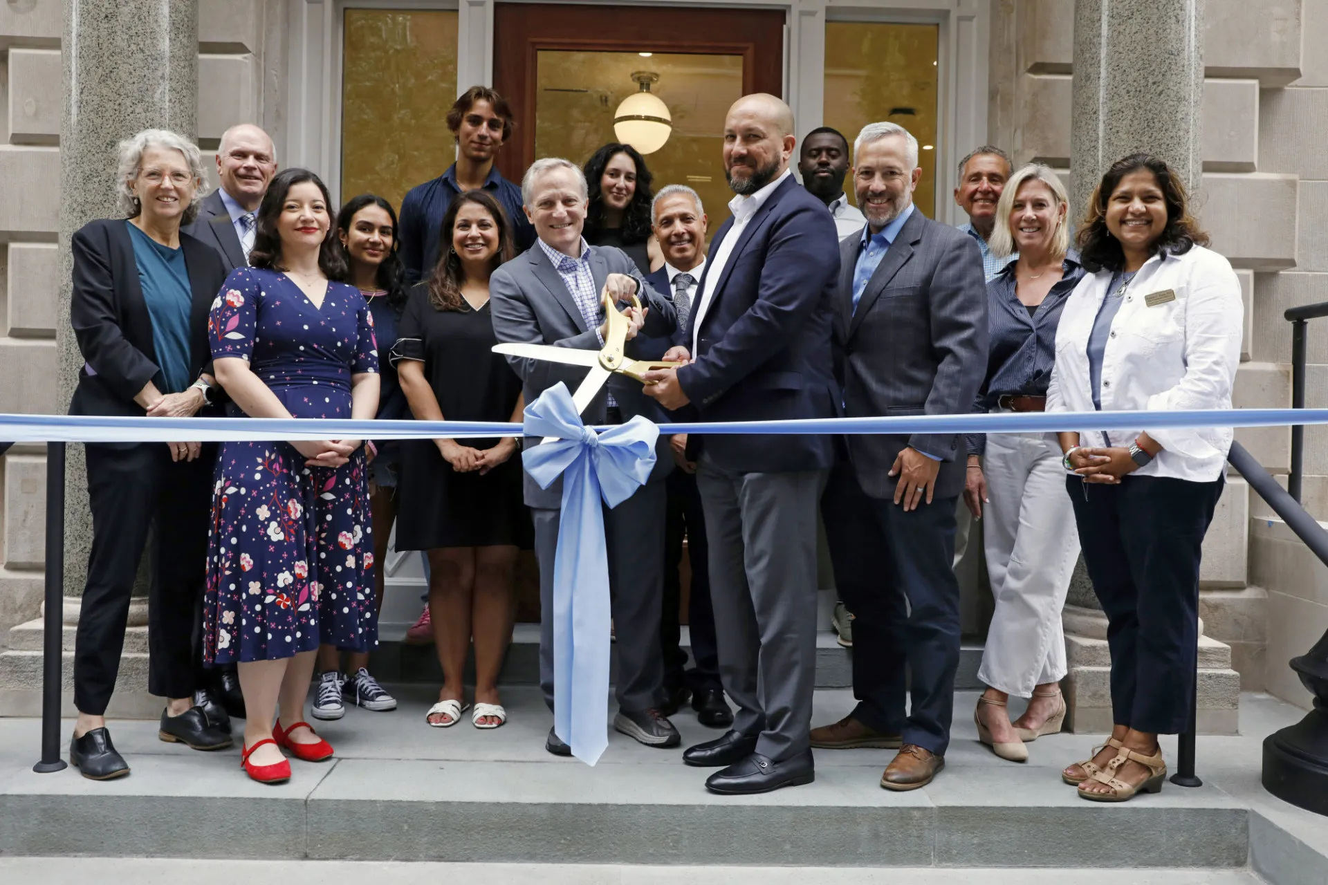 Columbia University leaders gathered for a ribbon cutting ceremony on August 20 to celebrate the opening of 611 W. 112th Street, the University's first all-electric residence hall. (Photo by Michael DiVito)