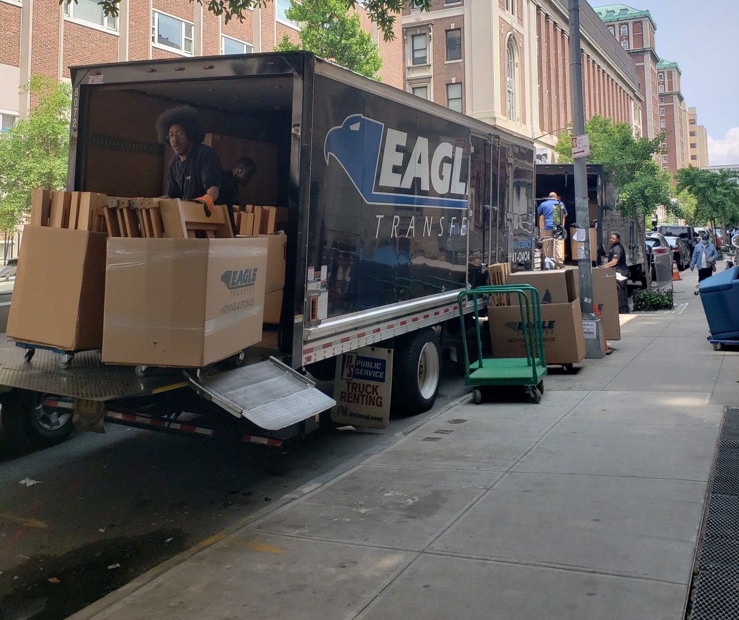 People unloading donations from a truck