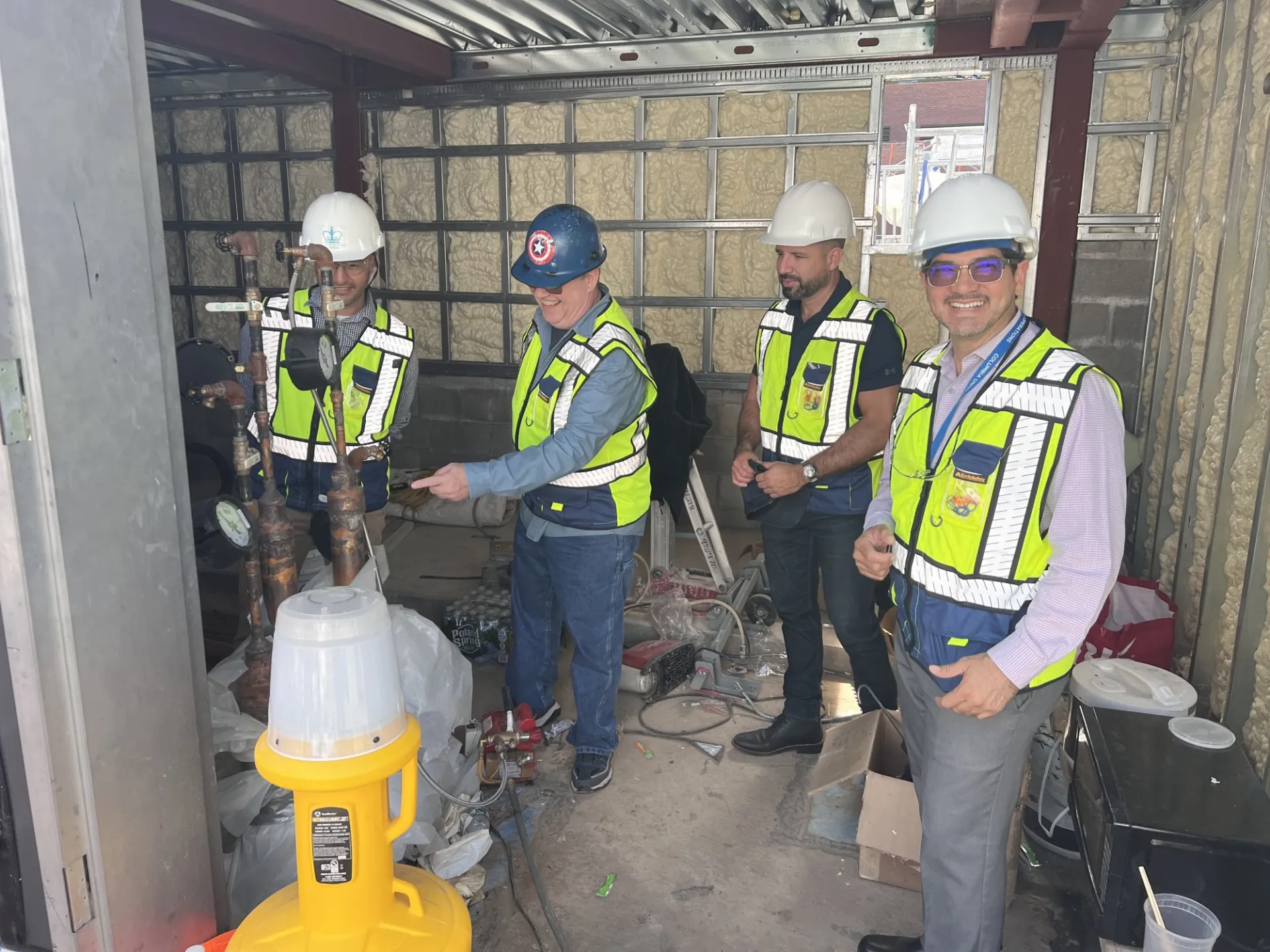 Hugo (right) and the commissioning team at work