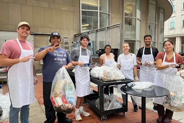 Students pose with Dining staff