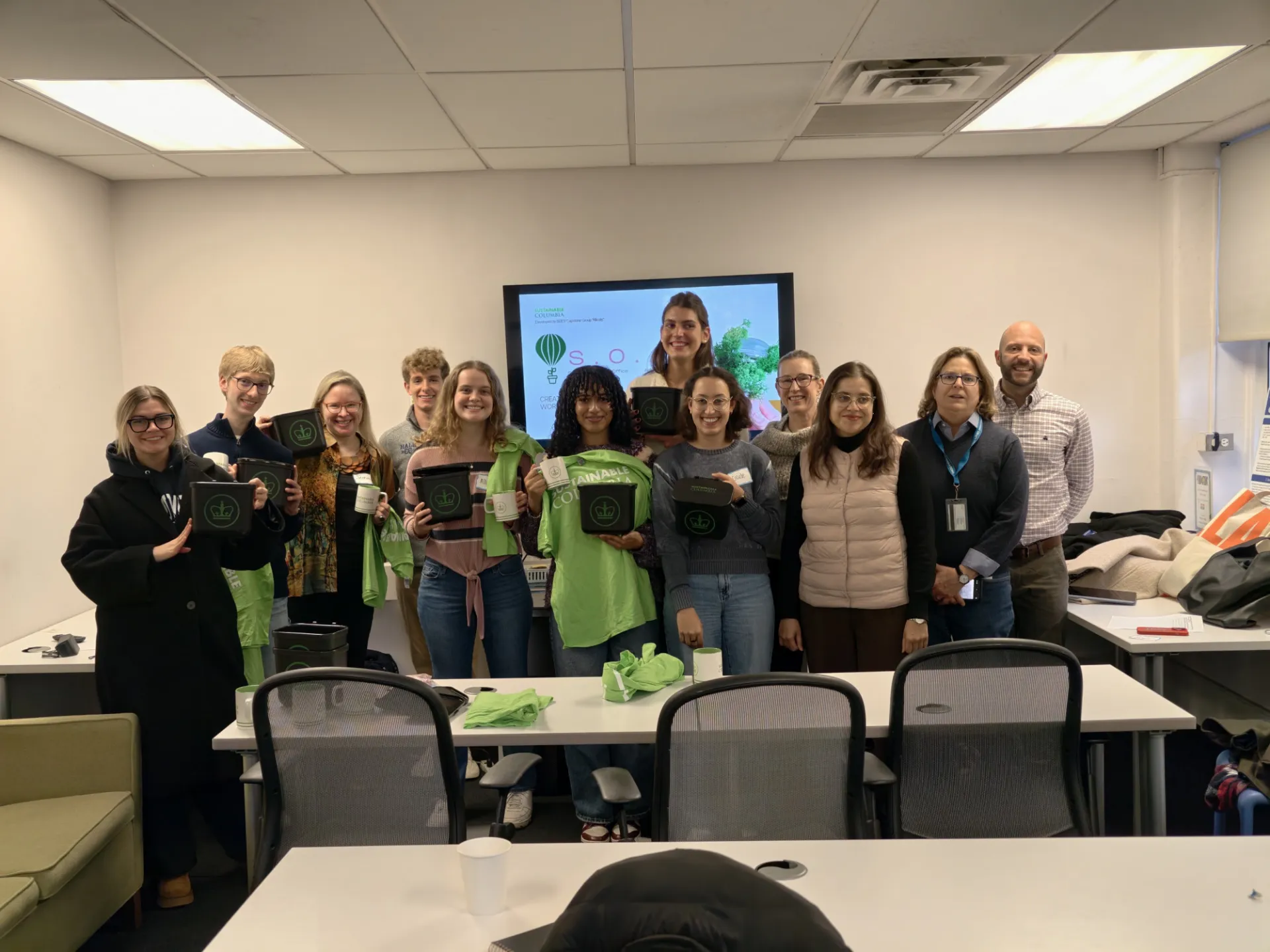 The capstone team poses with members of the Office of Sustainability