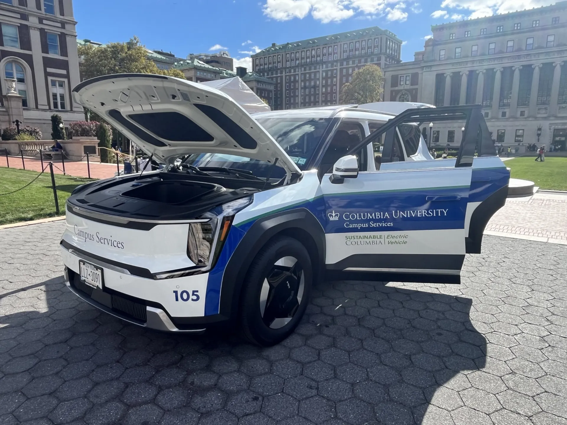 A Campus Services electric vehicle is parked on College Walk for viewing at the Columbia Fleet Show in October