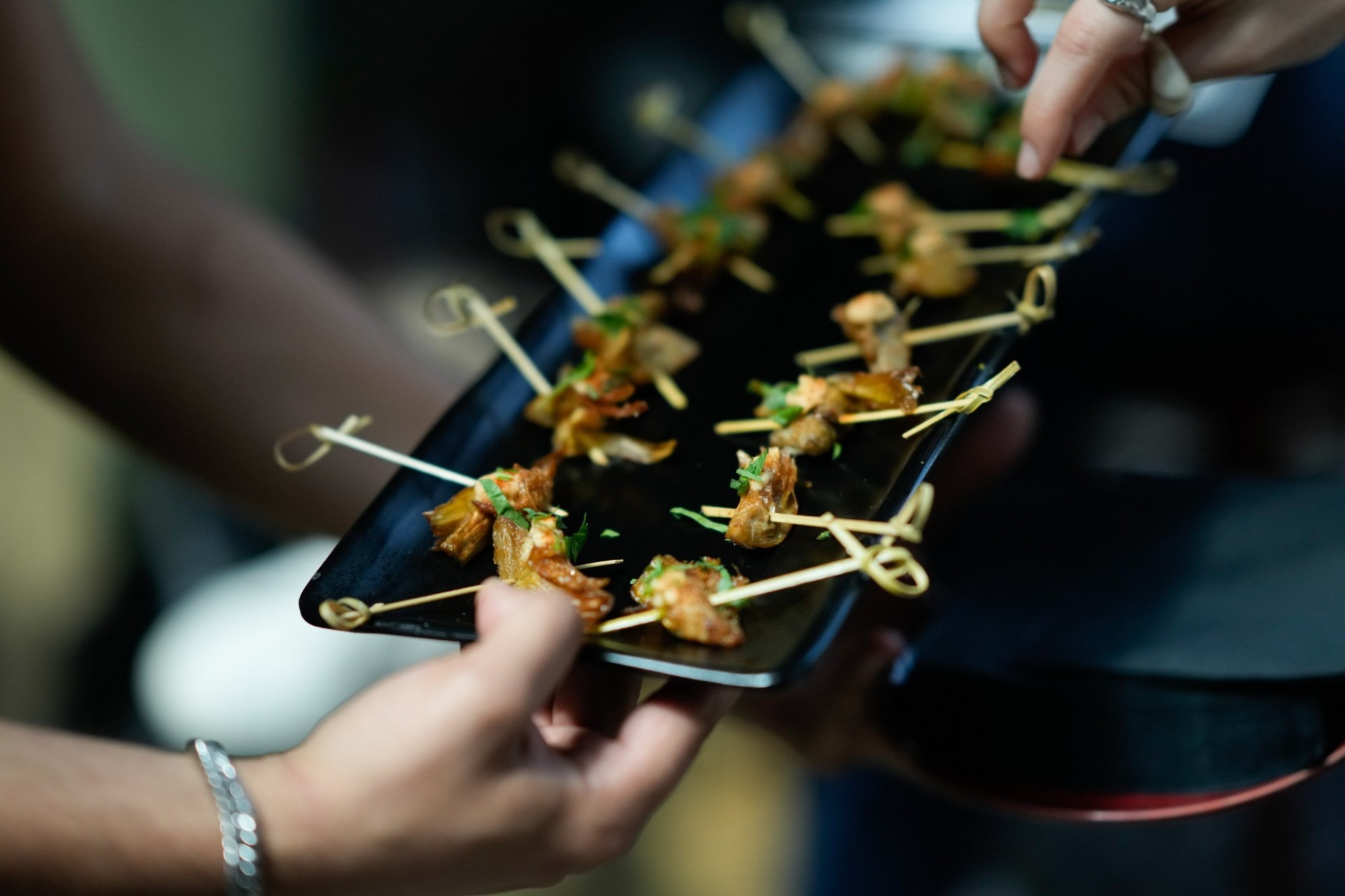 Fried artichokes are passed around