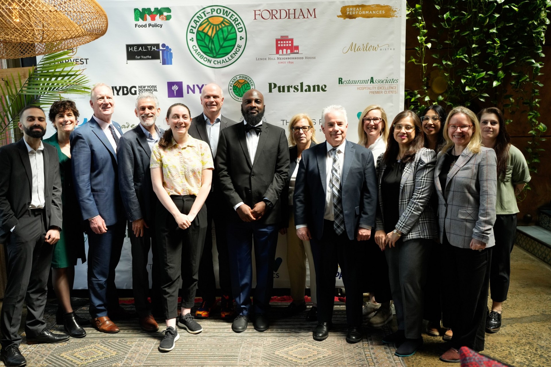 Representatives from NYU and Columbia pose for a photo