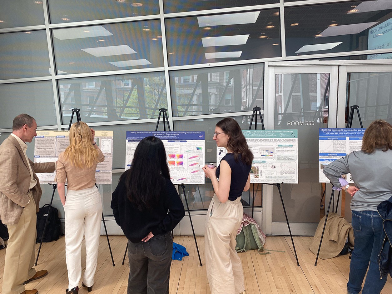Students present their research posters to attendees