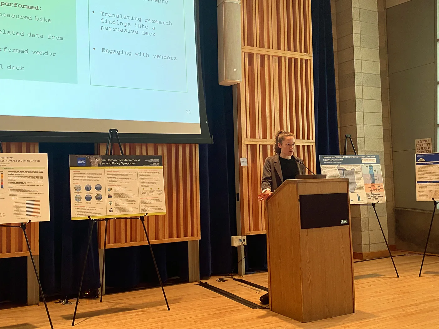 Julia speaks at a presentation on Earth Day