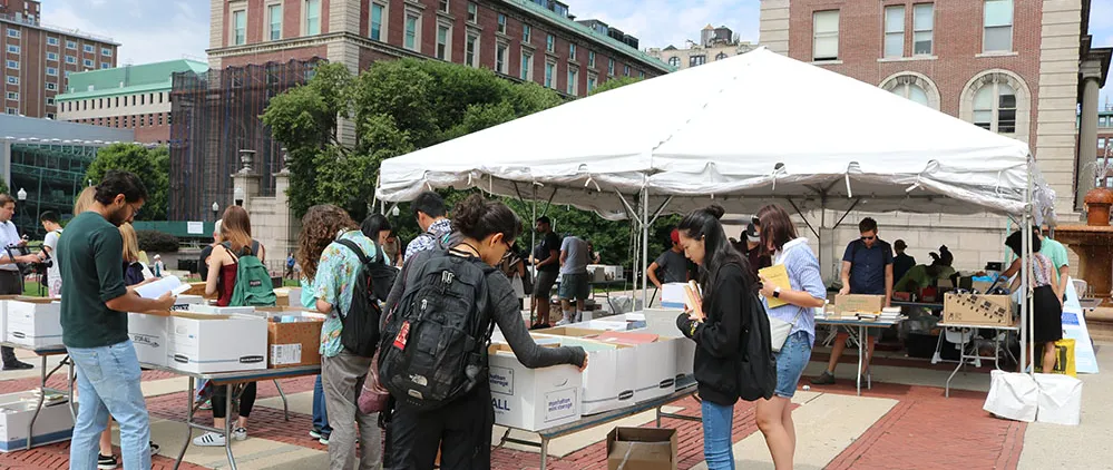 Clean and Go Green tents set up on College Walk in the summer